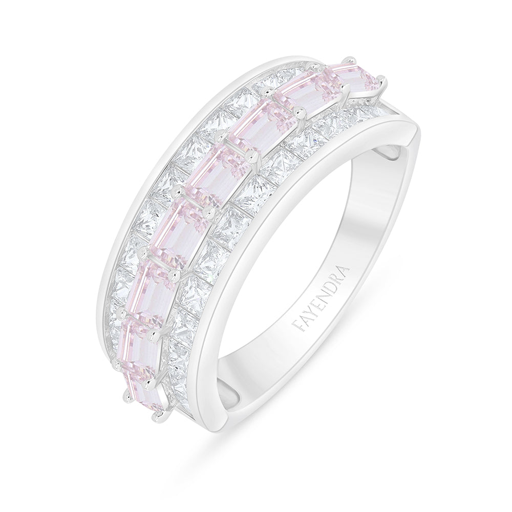 Rhodium plated sterling silver ring with pink zircon featuring elegant design and sparkling gemstones.