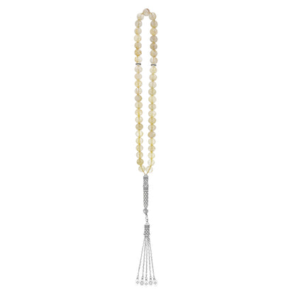Natural Rutile Bead Rosary – 33 handmade beads featuring silver accents for spiritual practice or decoration.